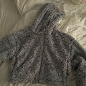 Light blue fuzzy zip up Urban outfitters